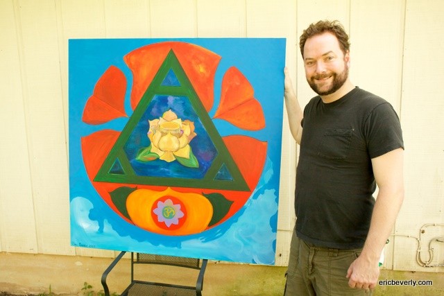 Eric Beverly with new painting (piece for meditation with lotus, triangle, and circle)